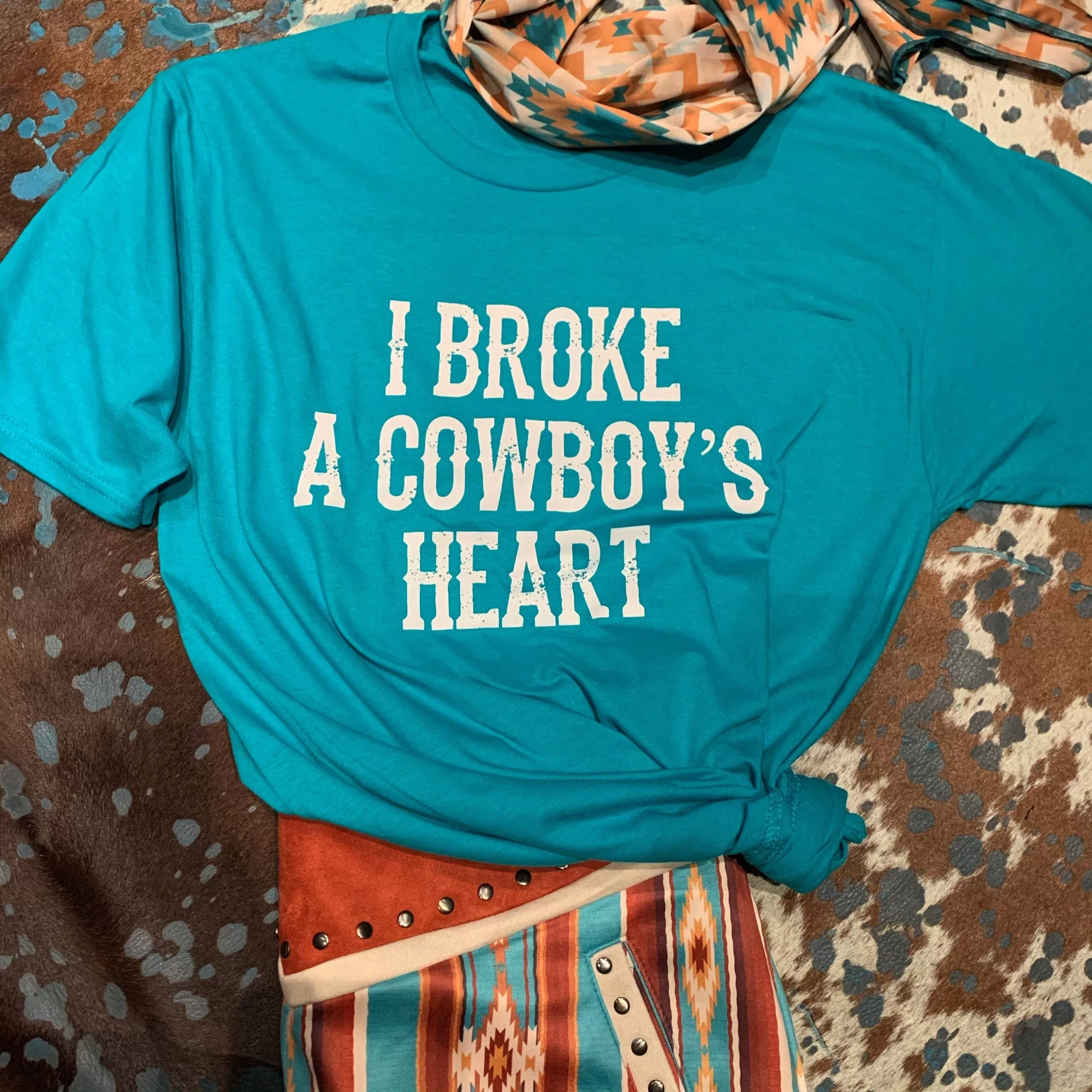 Teal I broke a cowboys heart tee