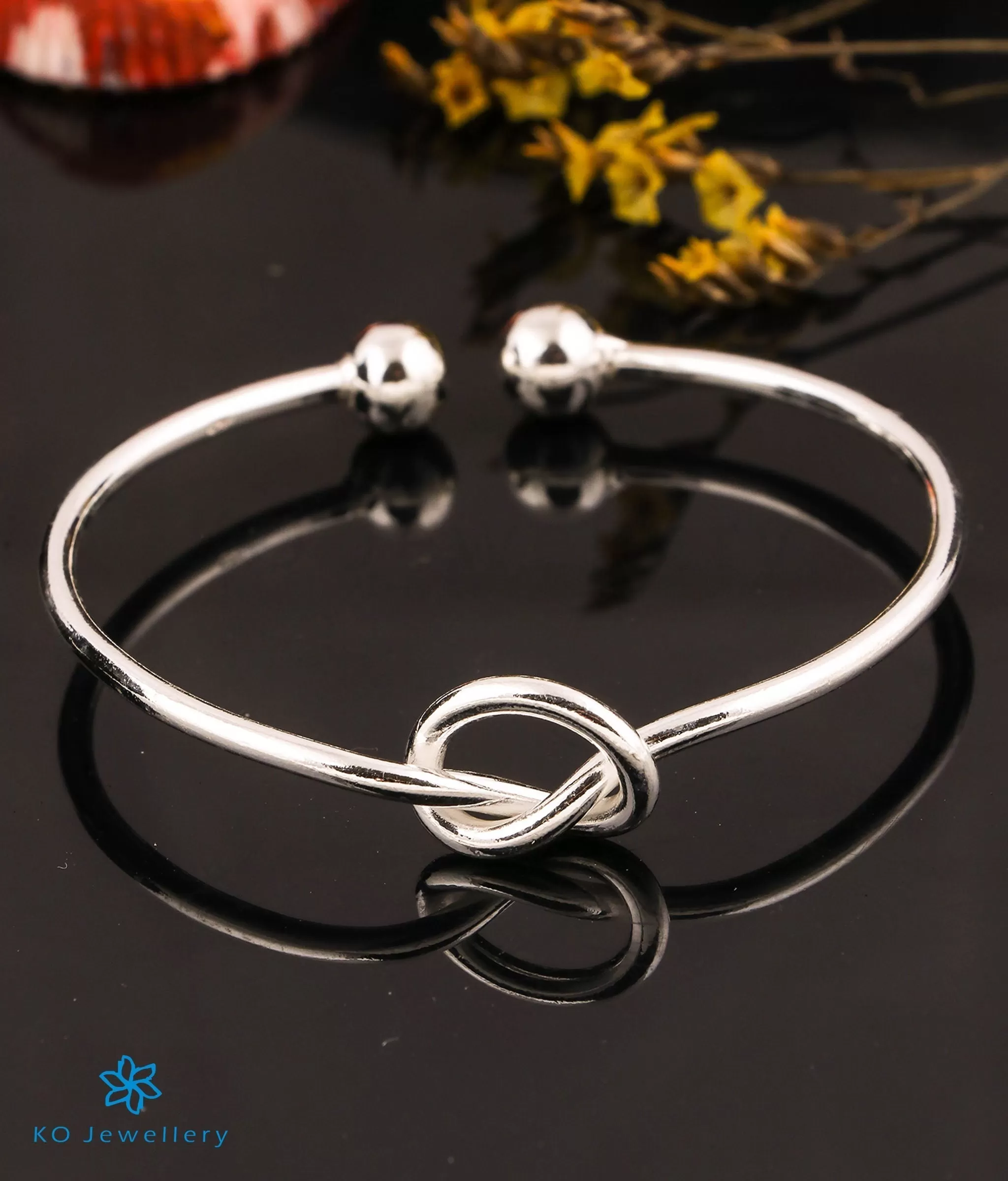 The Looped Silver Flexible Open Bracelet